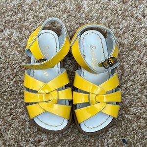 Yellow salt water sandals